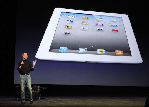 Apple Inc. CEO Steve Jobs introduces the iPad 2 on stage during an Apple event in San Francisco