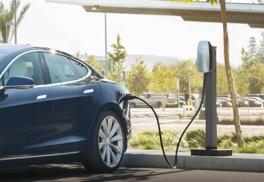 Tesla’s Workplace Charging program will install charging stations at your office