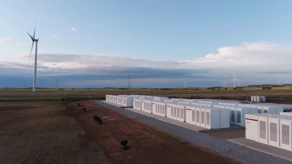 Tesla says it’s not being paid properly because batteries send power too quickly