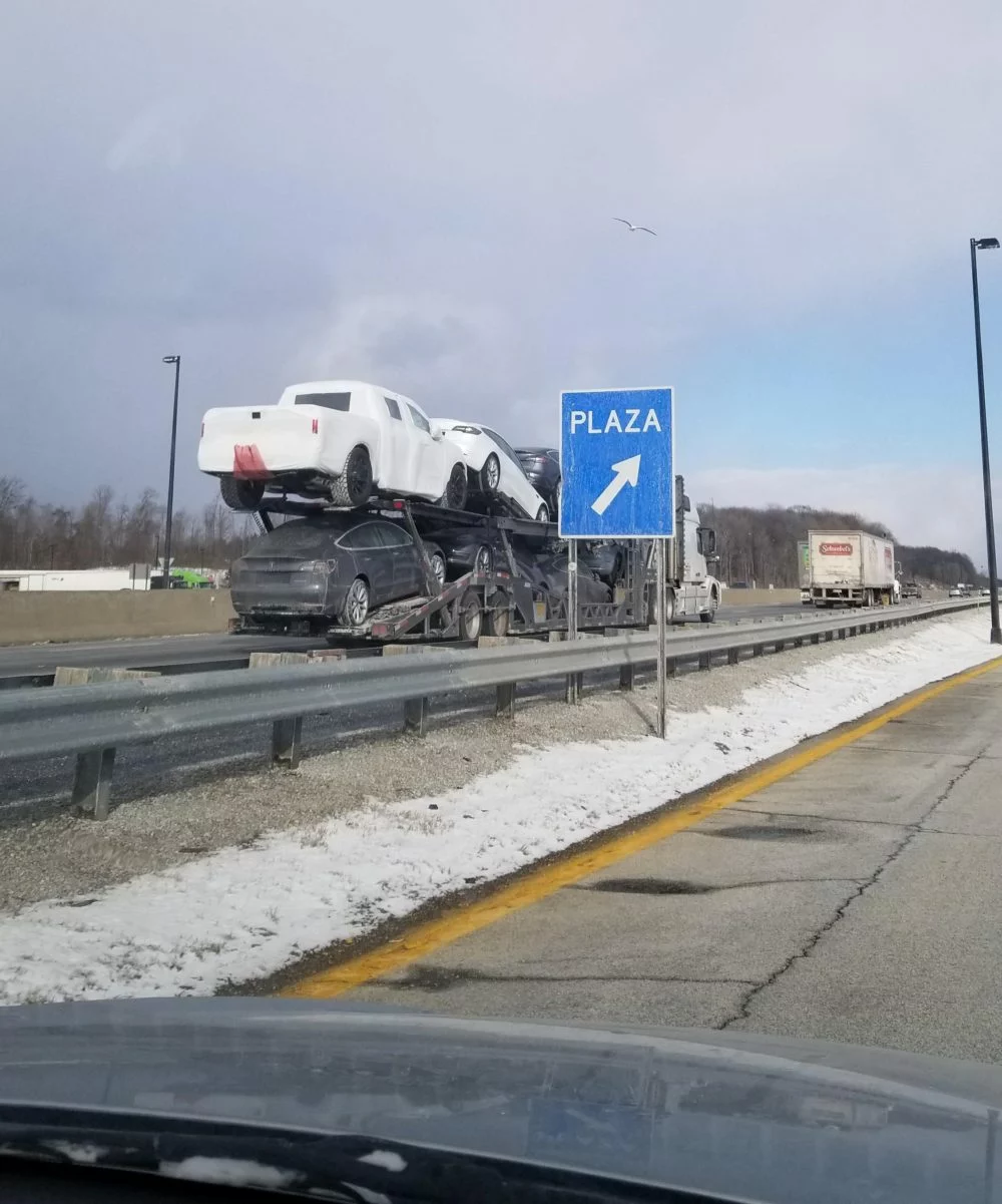 tesla carrier is spotted carrying a wrapped pickup truck sparking speculation2