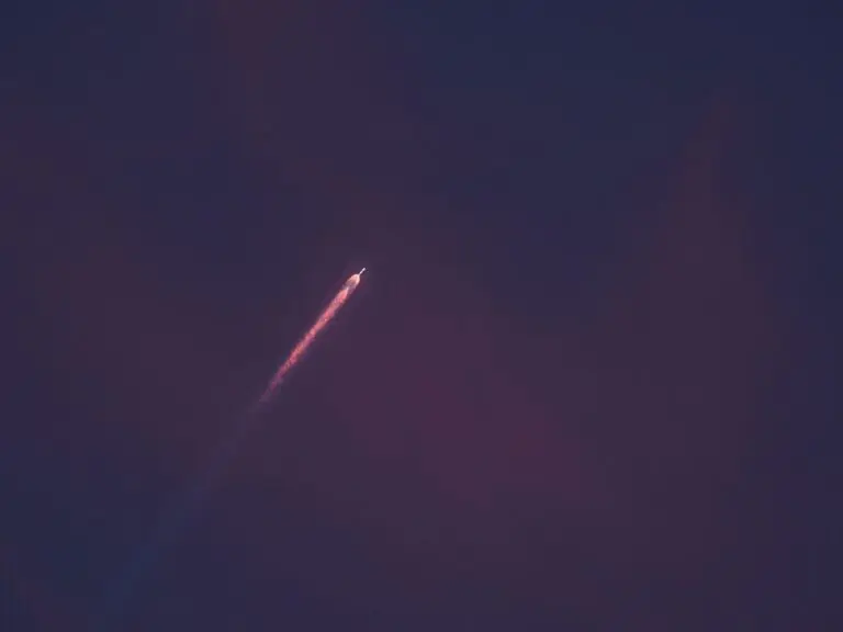 Rocket climbing through a dusk sky, a visual for the SpaceX lockup expiry