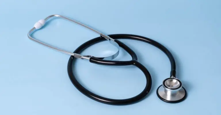 Stethoscope on a desk, a symbol of HSA eligibility and health plan choices