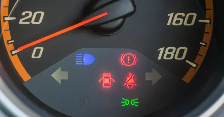 Car dashboard speedometer for a driver checking car recalls