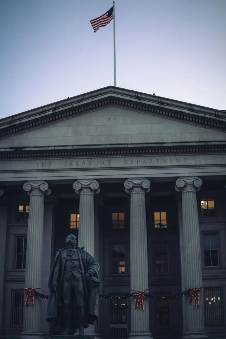 Facade of the U.S. Treasury Department building at dusk, illustrating foreign Treasury holdings