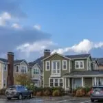 Suburban houses and parked cars, the housing market tracked by the Case Shiller home price index