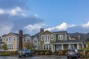 Suburban houses and parked cars, the housing market tracked by the Case Shiller home price index
