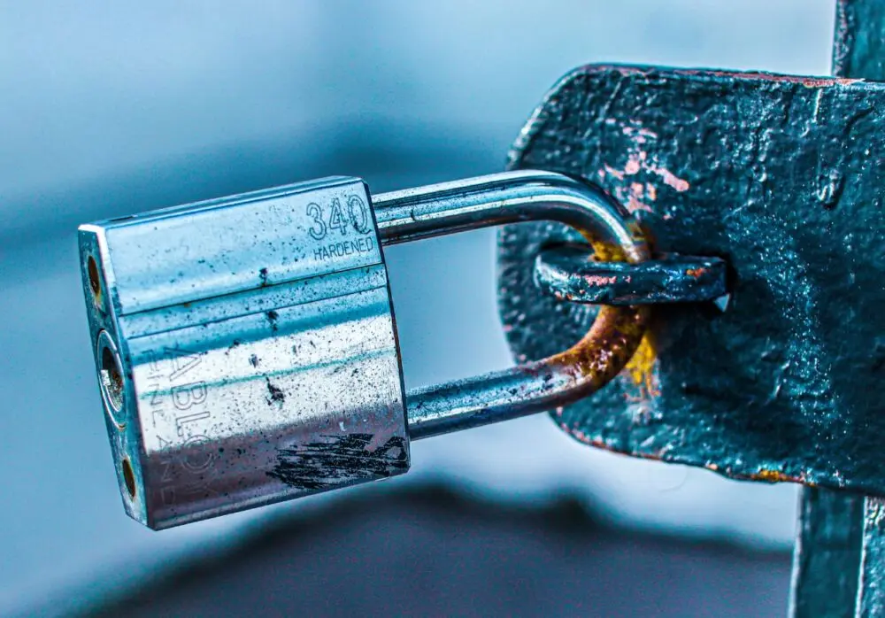 Close-up of a padlock on a chain, representing the PHP2Shell patch urgency