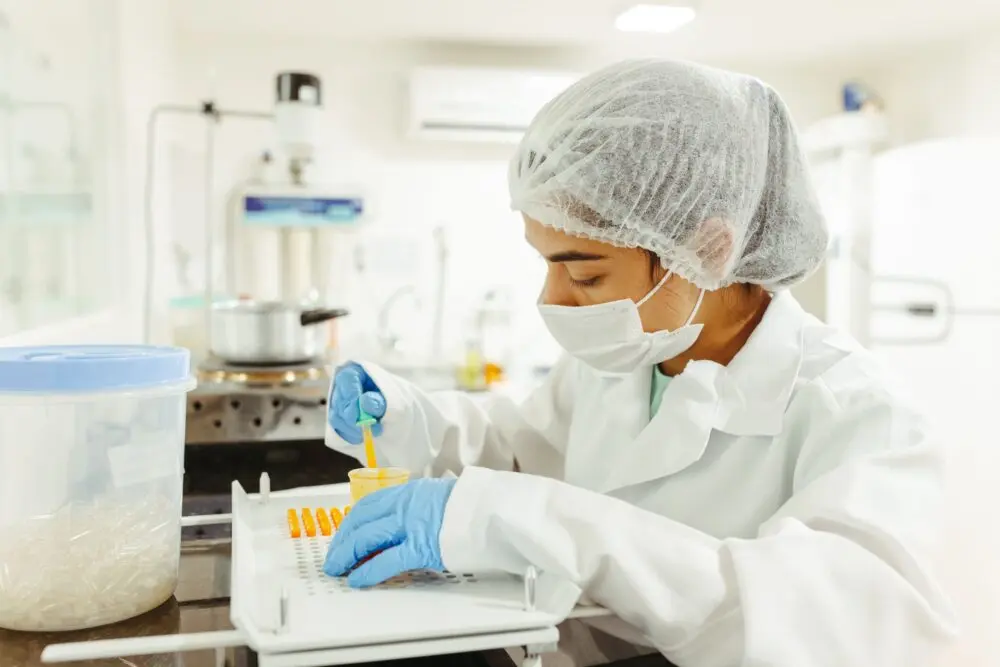 Laboratory worker doing tests, illustrating the Quest Diagnostics breach