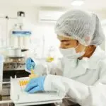 Laboratory worker doing tests, illustrating the Quest Diagnostics breach