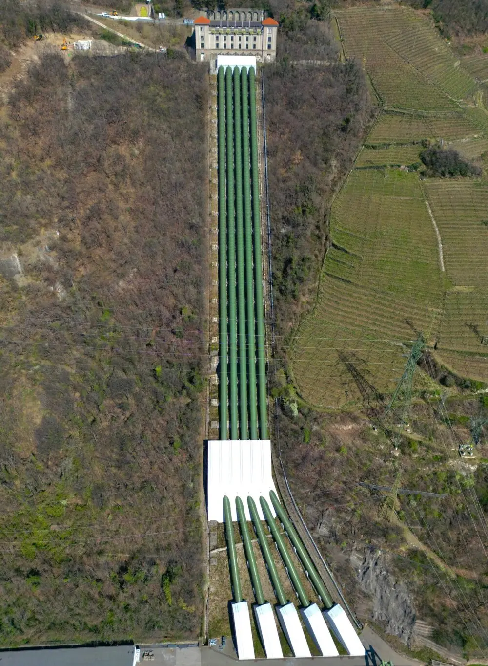 Aerial view of a long gas pipeline running through a forest, a generic picture for the EQT Range merger