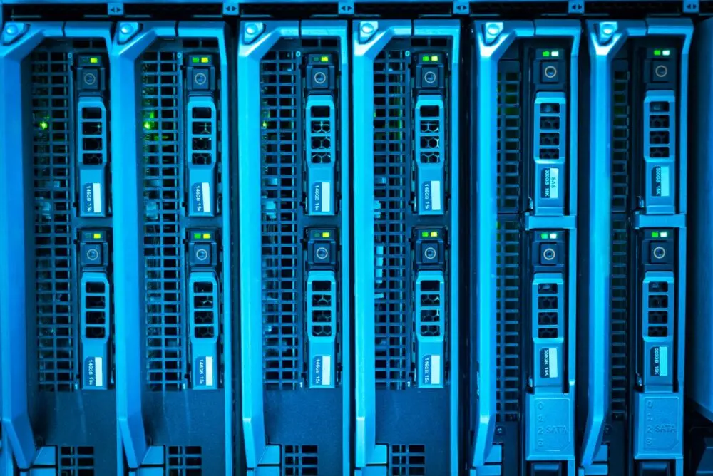 Illuminated server racks in a data center, the kind of hosting hardware PHP2Shell puts at risk