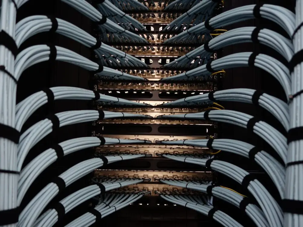 Organized network server cables in a data center rack
