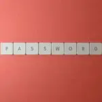 Keyboard tiles spelling PASSWORD, illustrating 1Password for Agents and AI logins