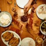 Overhead view of a Thanksgiving table, illustrating Thanksgiving dinner cost