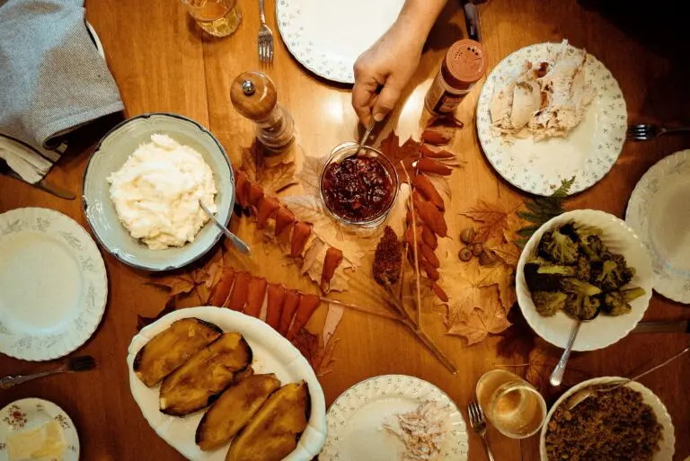 Overhead view of a Thanksgiving table, illustrating Thanksgiving dinner cost