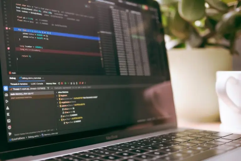 A laptop screen showing programming code, illustrating the AI coding tools at the center of the Replit Anthropic dispute