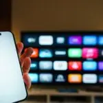 Living room with a smart TV showing YouTube TV plans