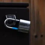 Close up of a padlock, illustrating the data security focus of the Proofpoint Varonis acquisition