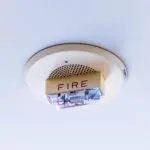 Ceiling mounted smoke and fire alarm, a reminder to change smoke alarm batteries