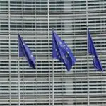 European Union flags waving, as EU AI Act enforcement begins