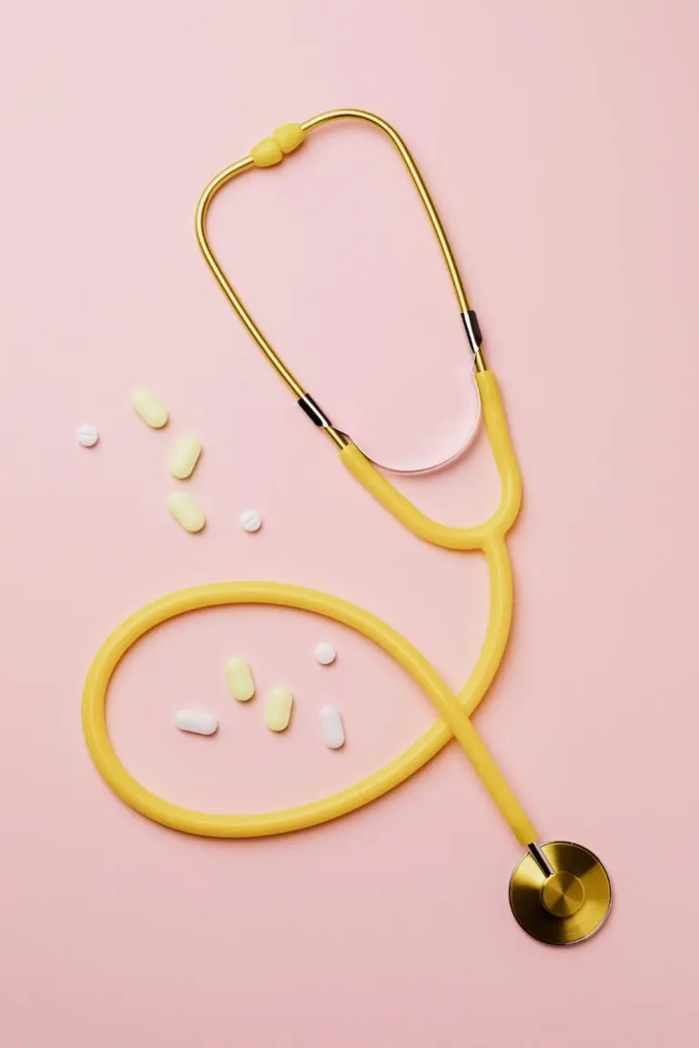 Stethoscope and medicines on a pink background, illustrating 2027 HSA limits