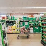 Shopping cart in a supermarket aisle, a generic image for consumer goods and Procter and Gamble earnings