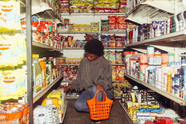 Shopper choosing goods in a store as the consumer confidence index nears its release