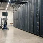 Rows of server racks in a data center, the kind of infrastructure at stake in the Railway breach