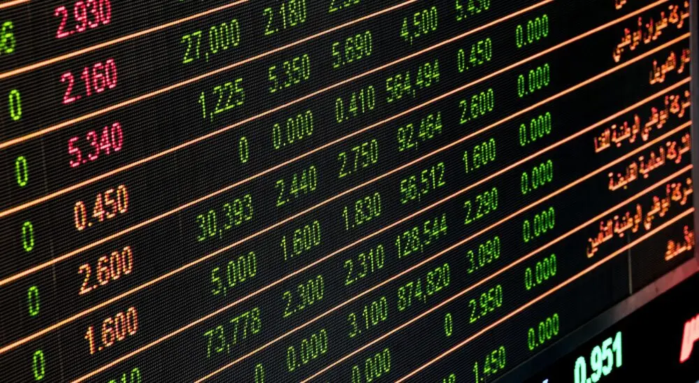 Stock market screen with green numbers, as investors weigh the Meta stock split