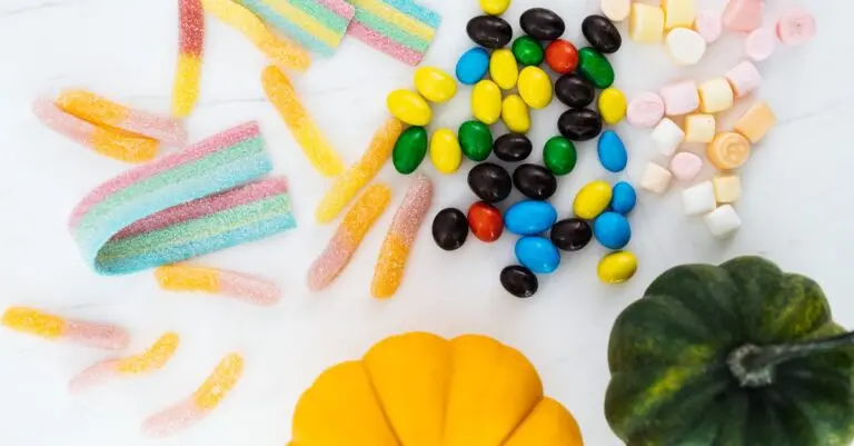 Halloween candy and mini pumpkins illustrating record Halloween spending
