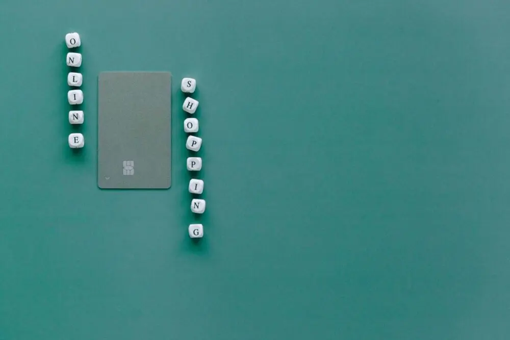 Bank card and letter blocks on a green background