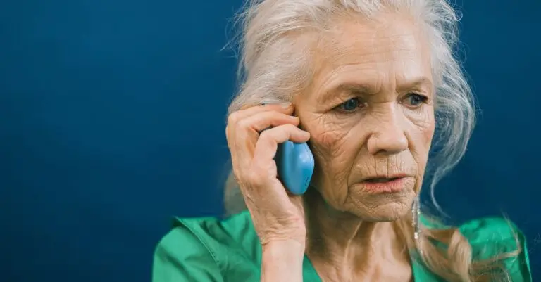 Older woman on the phone, a common setting for Medicare scams