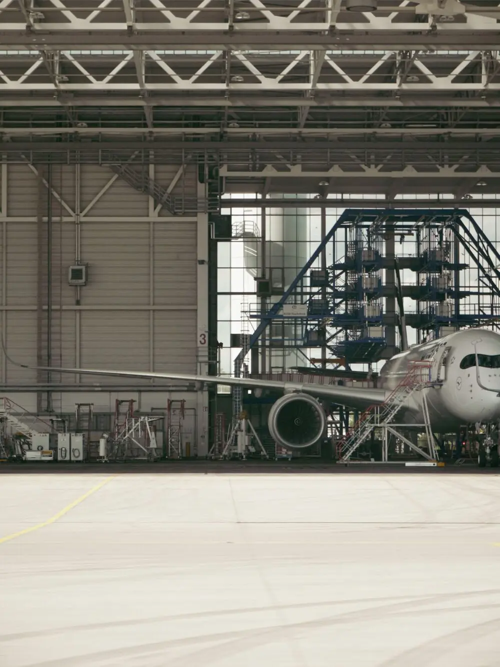 Commercial airplane in a hangar ahead of Boeing earnings