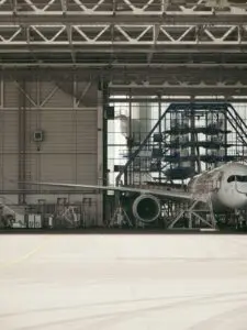 Commercial airplane in a hangar ahead of Boeing earnings